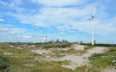 Beverwijk — Dunes, windmills and industry on the Wijk aan Zee Noordpier, Velsen, 2022.jpg